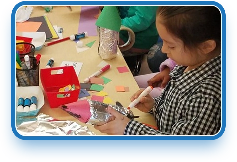 a child exploring crafts with kids 1st childcare progrrams at one of the best preschools near me in los angeles